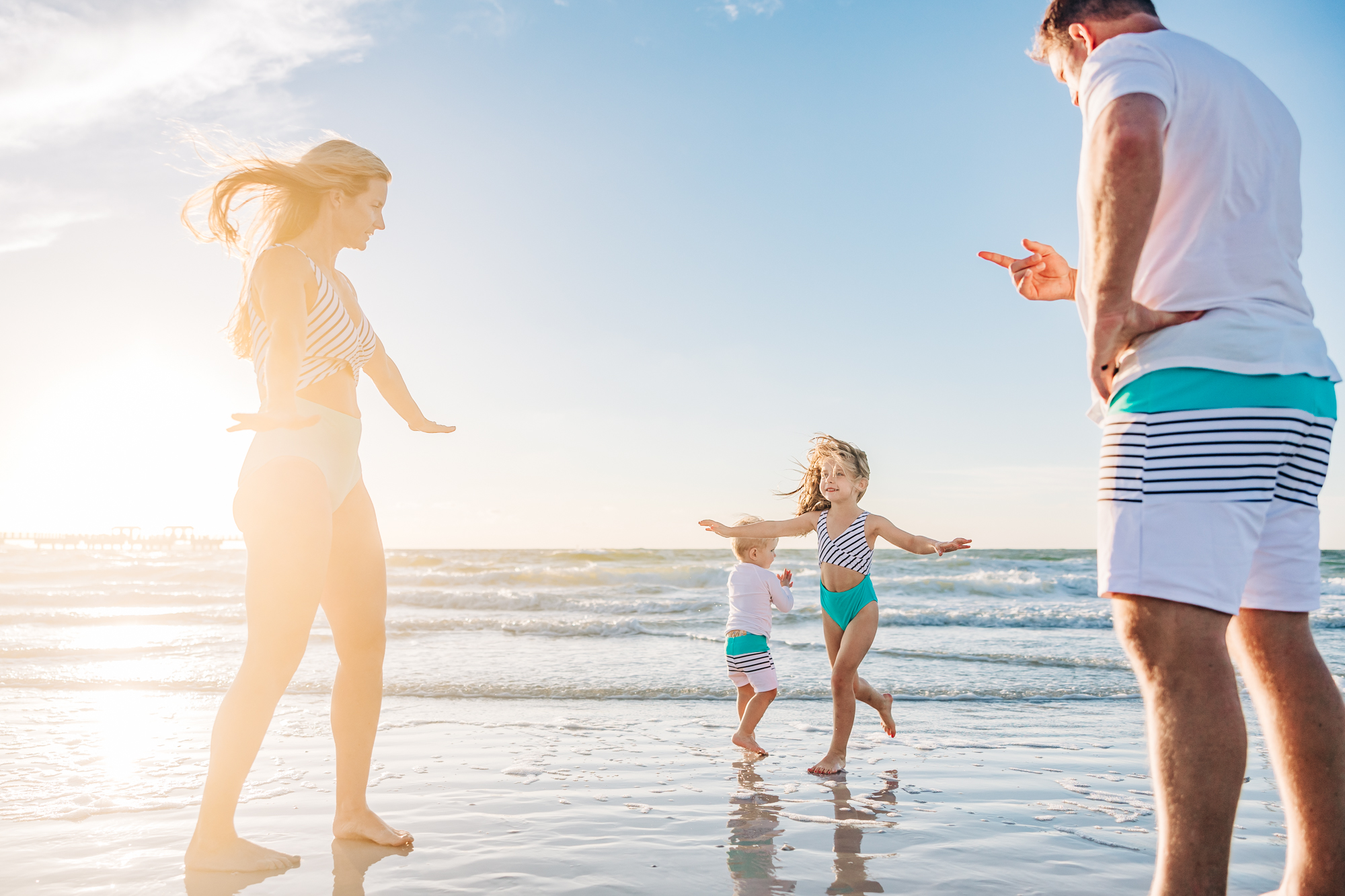 Imagen AI Photo editing of family playing on the beach